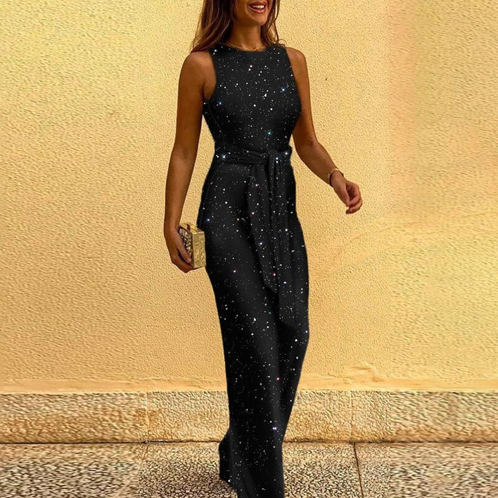 "Women's elegant sequin jumpsuit, dazzling and tailored for evening events, sparkles with every move against a plush lining."
