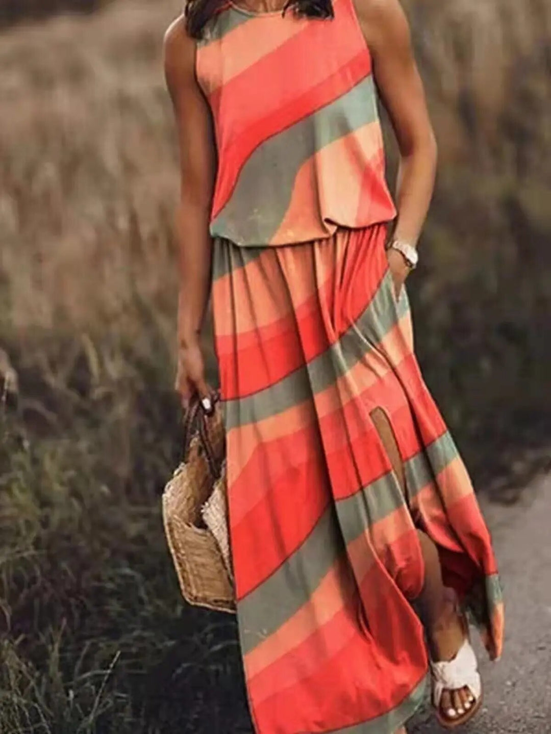 Women's elegant sleeveless maxi dress front view; flowing design, flattering silhouette; perfect for any occasion.