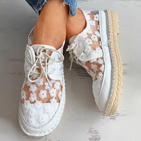 "Women's embroidered lace sneakers with floral mesh design, airy and elegant, featuring cushioned insoles for comfort."