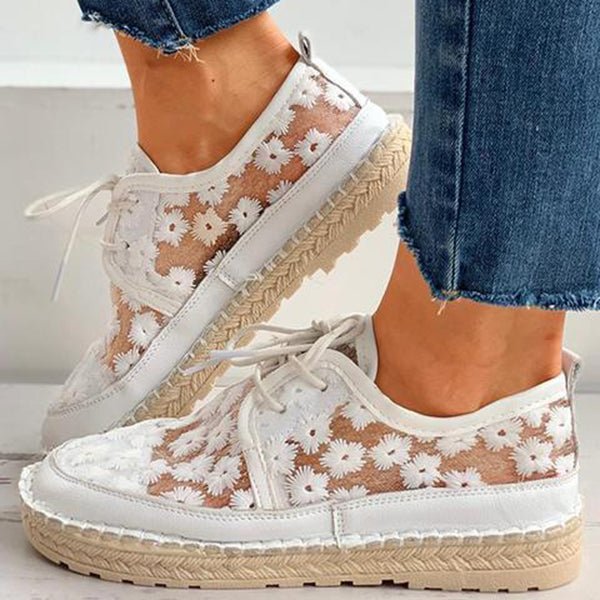 "Women's embroidered lace sneakers with floral mesh design, airy and elegant, featuring cushioned insoles for comfort."