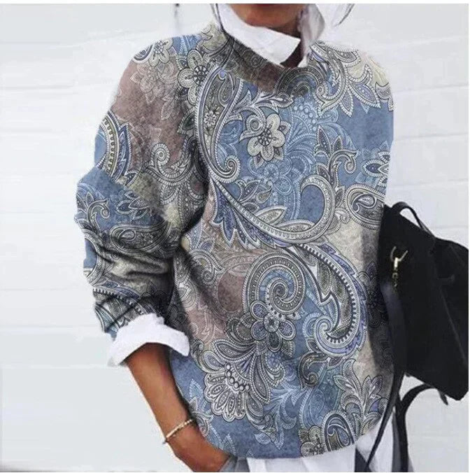 Detailed view of the patterned sleeves on a women's retro sweater.