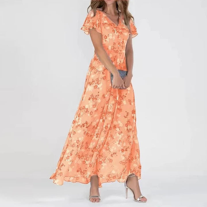 "Women's floral print maxi dress with V-neck, flutter sleeves, and flowy silhouette perfect for garden parties or weddings."