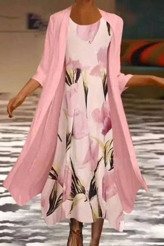 "Women's floral two-piece layered midi dress with flowing silhouette, ideal for spring/summer, in a breathable fabric."