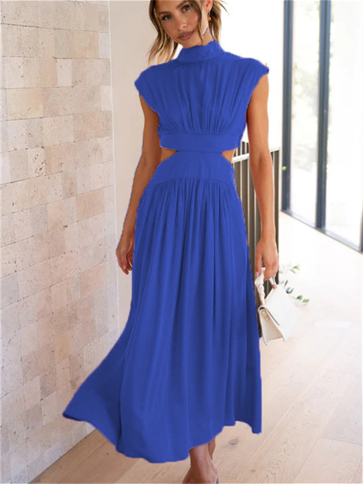"Women's flowy summer Vespera dress, lightweight and elegant, showing a flattering silhouette for chic sunny day style."