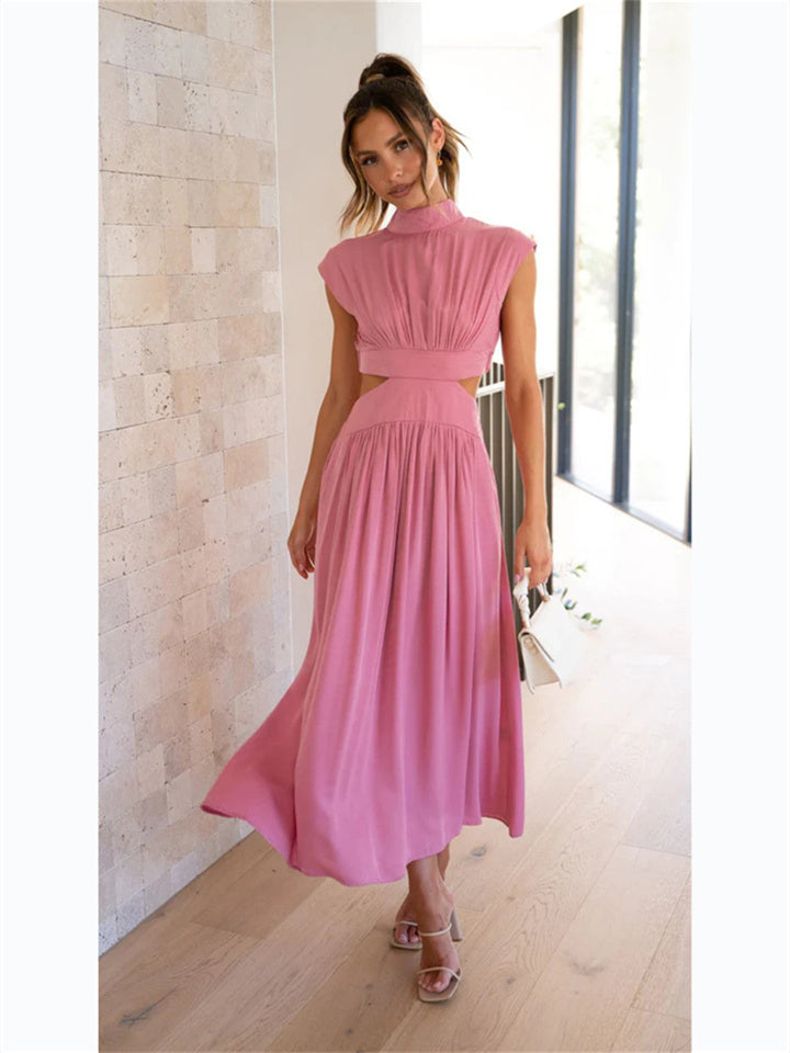 "Women's flowy summer Vespera dress, lightweight and elegant, showing a flattering silhouette for chic sunny day style."