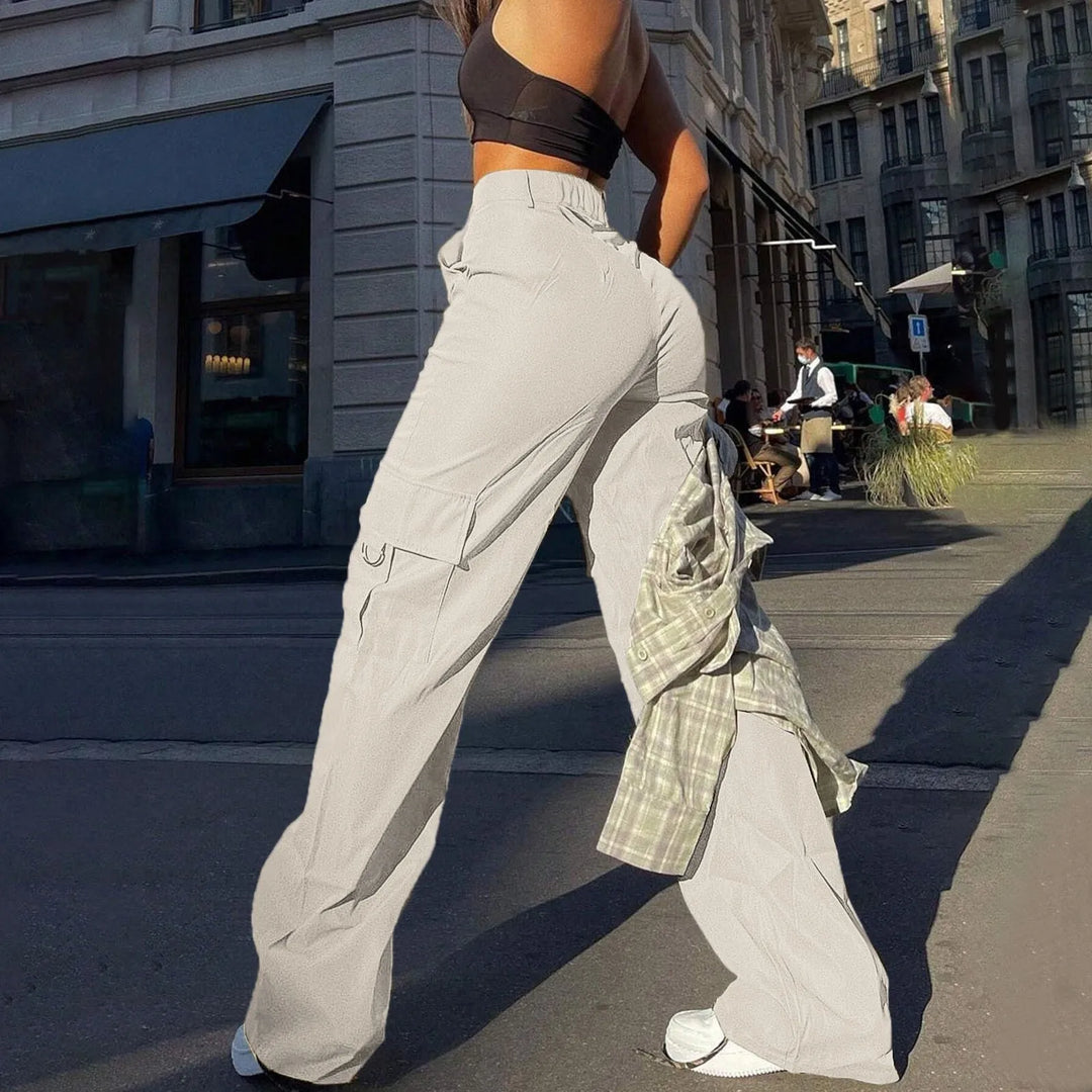 Women's high-waist cargo pants with functional pockets, showcasing durable fabric and versatile design for casual comfort.