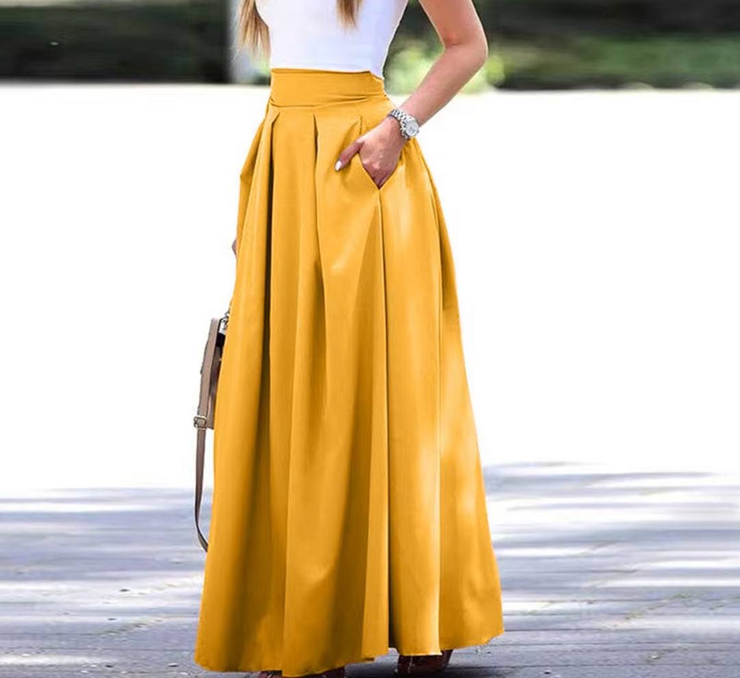 "Women's high waist pleated maxi skirt with elegant pleats, breathable fabric, and pockets for style and comfort."