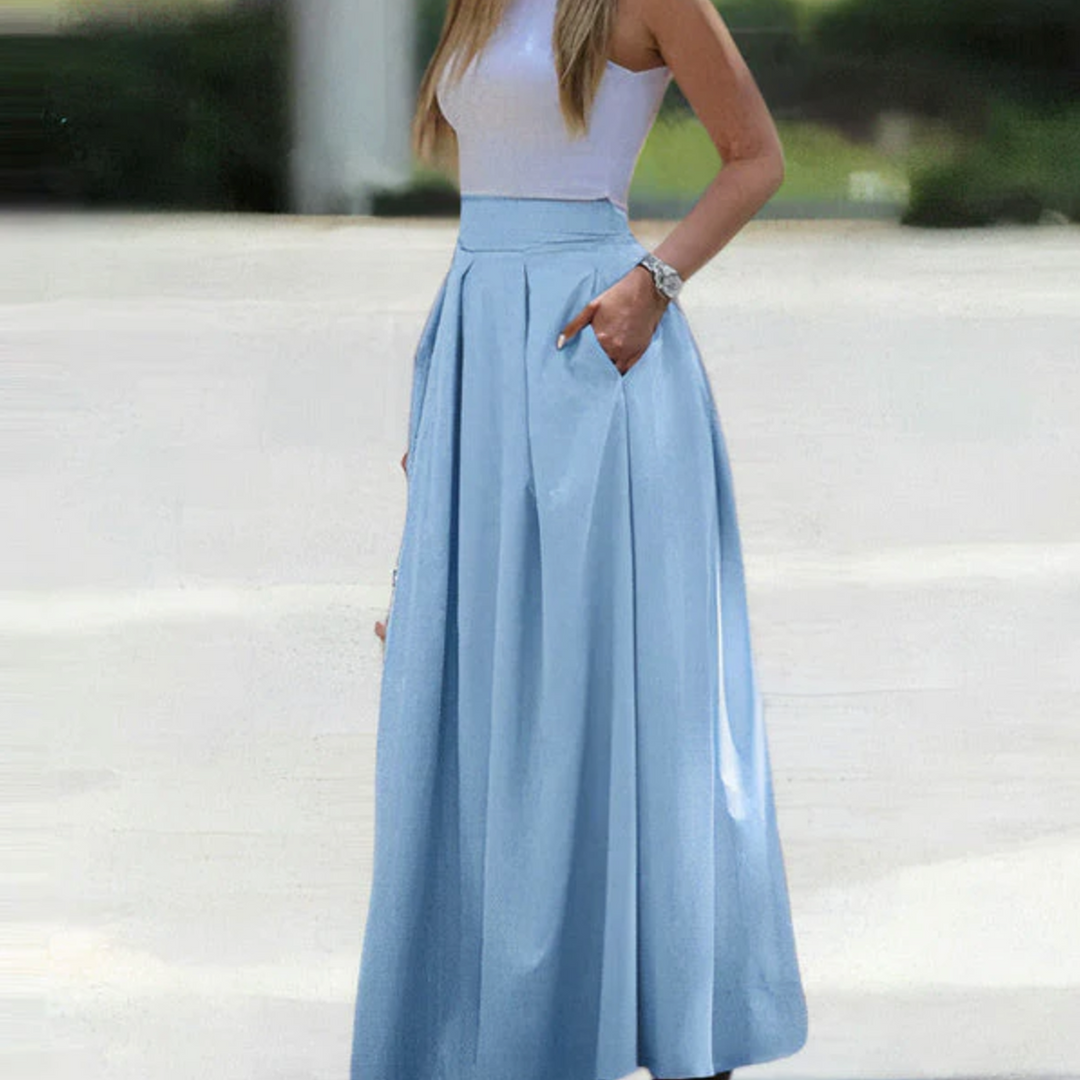"Women's high waist pleated maxi skirt with elegant pleats, breathable fabric, and pockets for style and comfort."