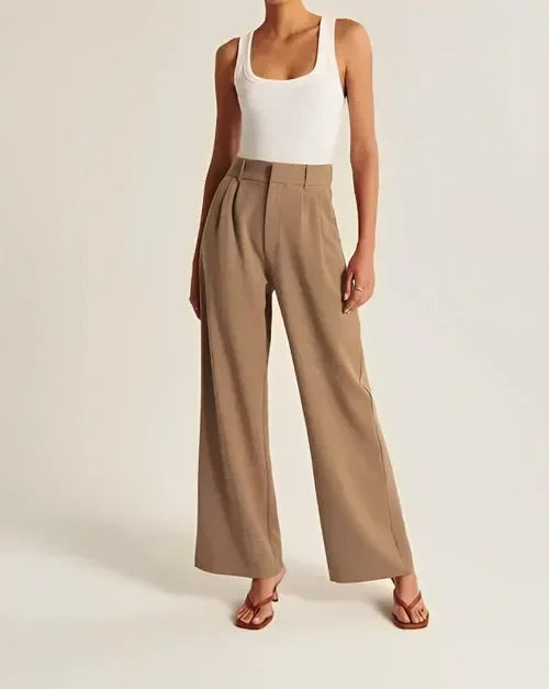 "Women's high-waist wide-leg trousers with pleated front, tailored fit, and soft wool blend for elegant and sophisticated sty