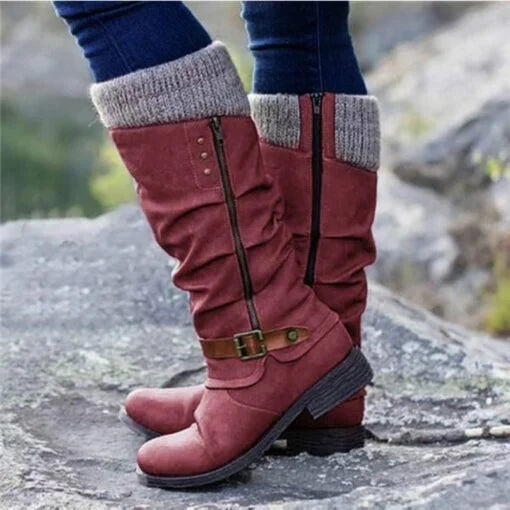 Women's knee-high boots with chic buckle, cozy knit cuff, side zipper, textured sole, and round toe in synthetic suede.