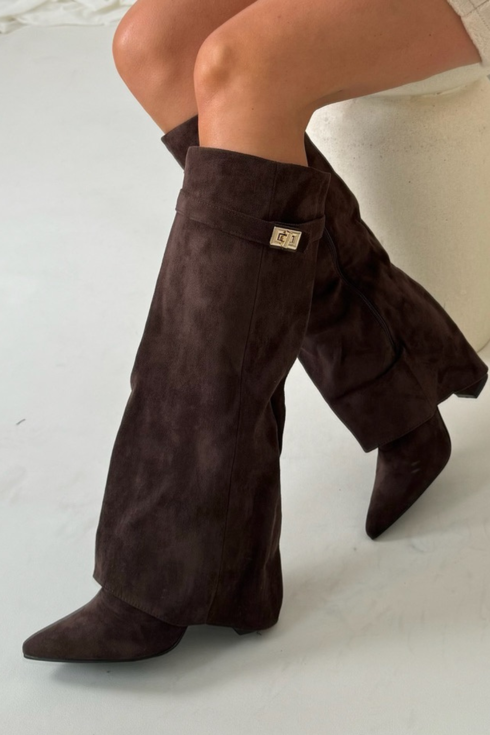 "Women's knee-high flap boots with textured design, pointed toe, block heel, side view for stylish fall fashion."