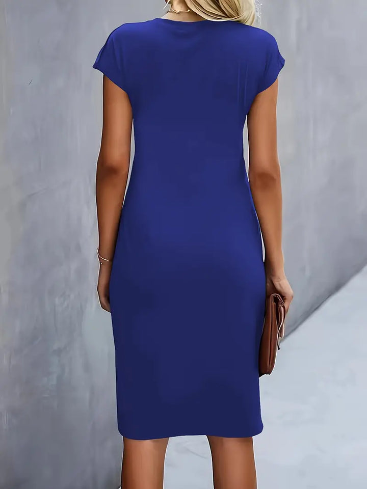 Women's knee-length sheath dress with cap sleeves and ruched waist, offering a flattering fit and elegant silhouette for any 