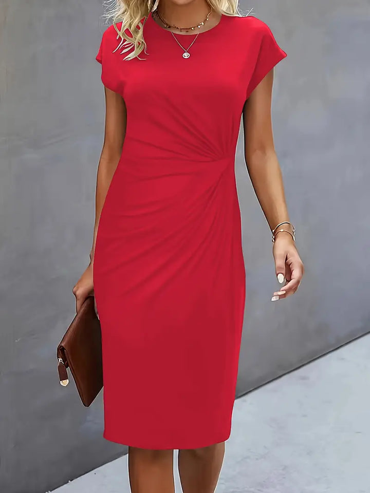 Women's knee-length sheath dress with cap sleeves and ruched waist, offering a flattering fit and elegant silhouette for any 
