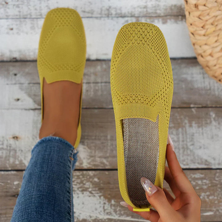 "Women's knit slip-on flats with square toe, breathable knit upper, and cushioned insole, side view."
