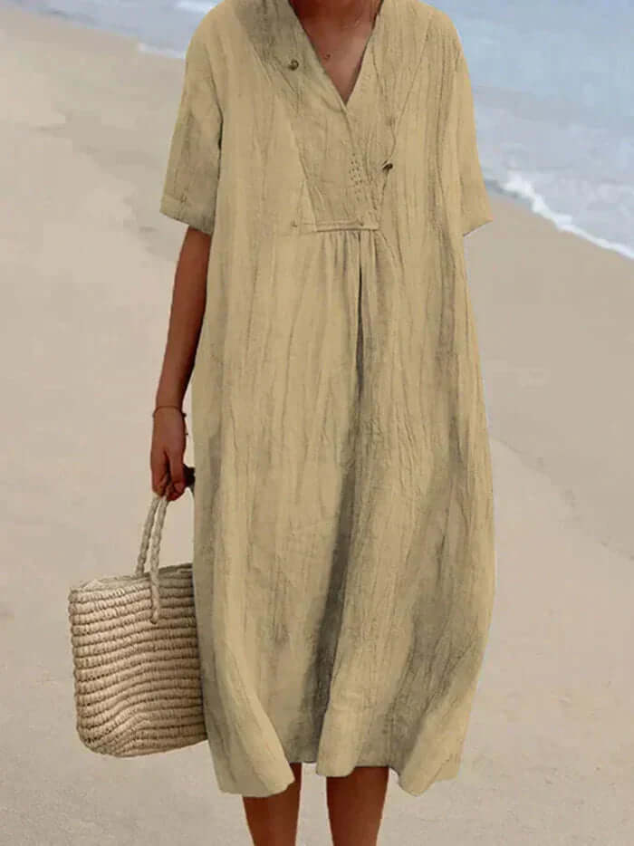 "Women's linen cotton summer dress, airy and breathable in pink, stylish modern silhouette, perfect for warm days."