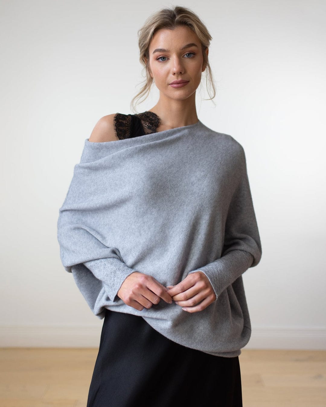 "Womens loose sweater with classic design, luxurious fit; available in beige, gray, black, green, purple, and more colors."