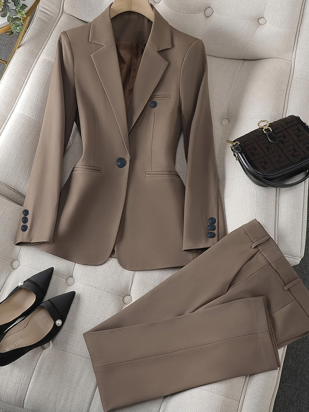 "Women's notched lapel blazer set, tailored fit, long sleeves, versatile all-season elegance, solid pattern in blue."
