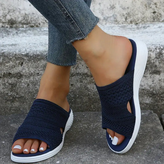 "Women's orthopedic open-toe knit sandals with contoured sole, stretch-knit upper, and slip-on design for comfort and style."
