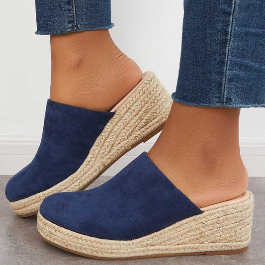 "Women's orthopedic wedge sandals, round toe, vegan suede, slip-on mule style, mid-height heel, chic beige design."