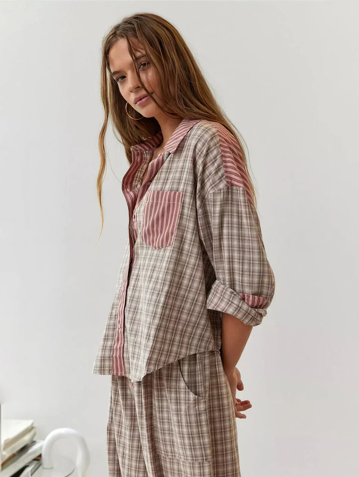 "Women's pink pajama set with elegant details, luxurious softness, and a relaxed fit, perfect for sleep and lounge."