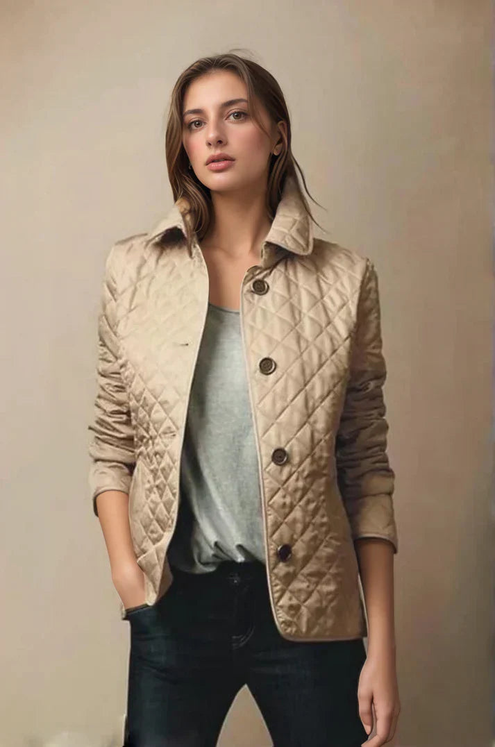 "Women's quilted button-up jacket with diamond pattern, perfect for lightweight warmth and stylish comfort in cooler weather.