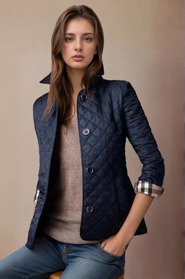"Women's quilted button-up jacket with diamond pattern, perfect for lightweight warmth and stylish comfort in cooler weather.