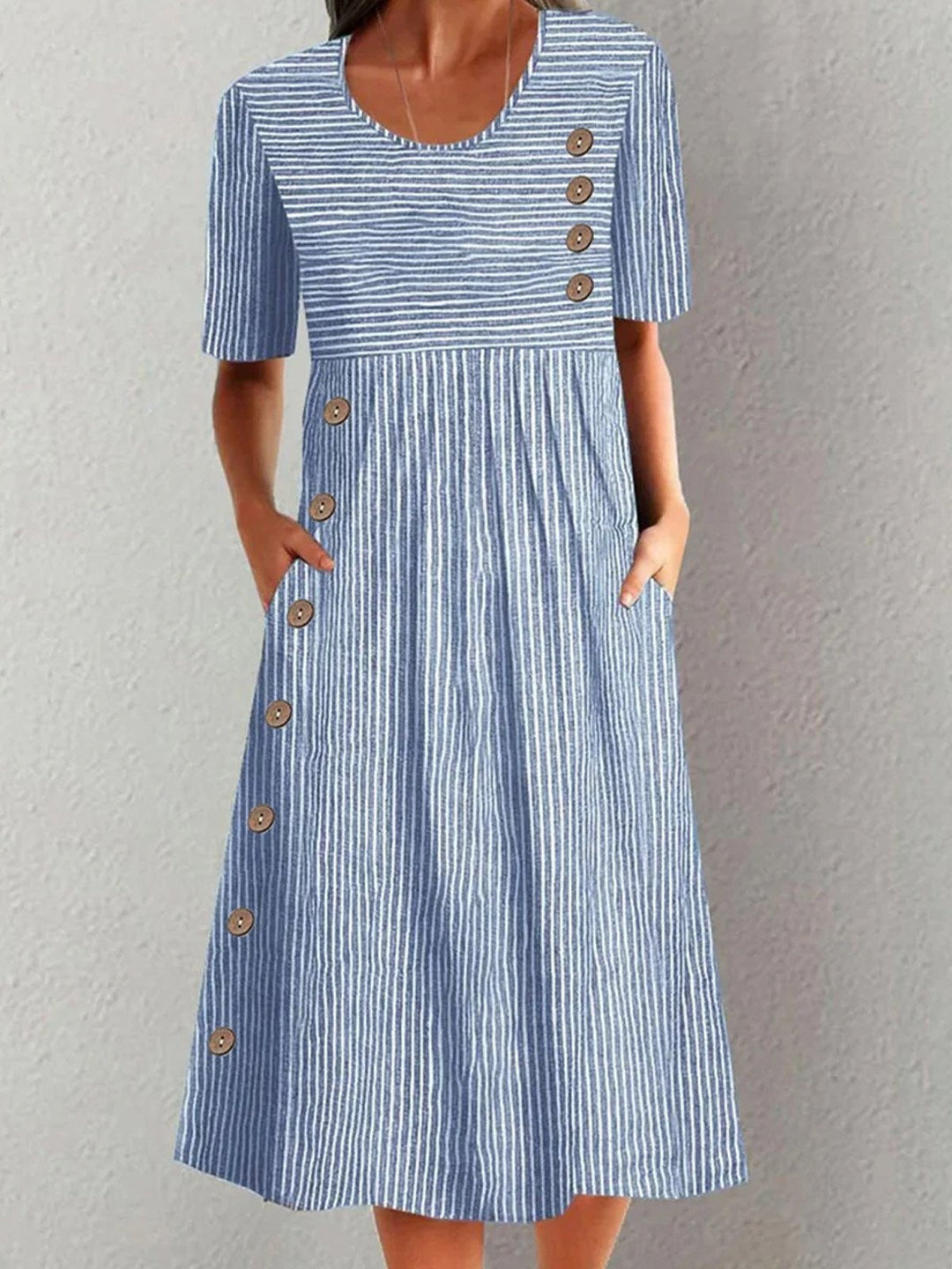"Women's relaxed fit striped midi dress, short sleeve, crew neck, elegant versatile pattern, perfect for warm seasons."