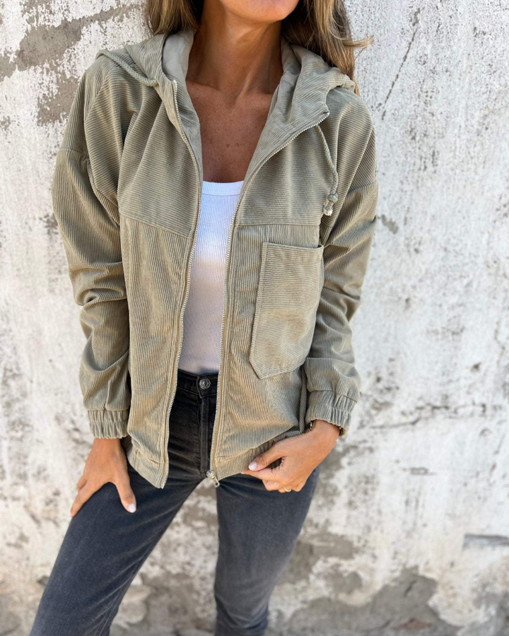 "Women's retro corduroy zip jacket with hood, showcasing vintage style with its textured fabric and practical zip closure."