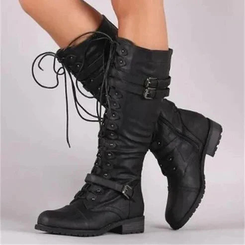 "Women's retro lace-up knee-high boots with chic buckle accents, shown in a stylish vintage design ideal for fall wear."