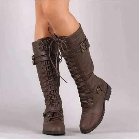 "Women's retro lace-up knee-high boots with chic buckle accents, shown in a stylish vintage design ideal for fall wear."