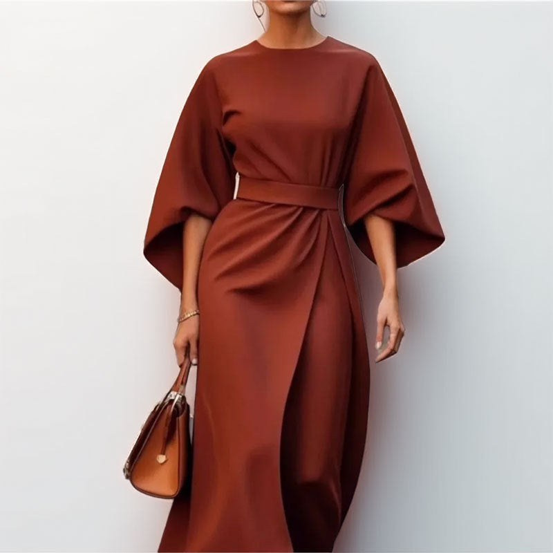 Women's satin batwing maxi dress, elegant draped silhouette, fitted waist, flowing skirt, perfect for formal occasions.