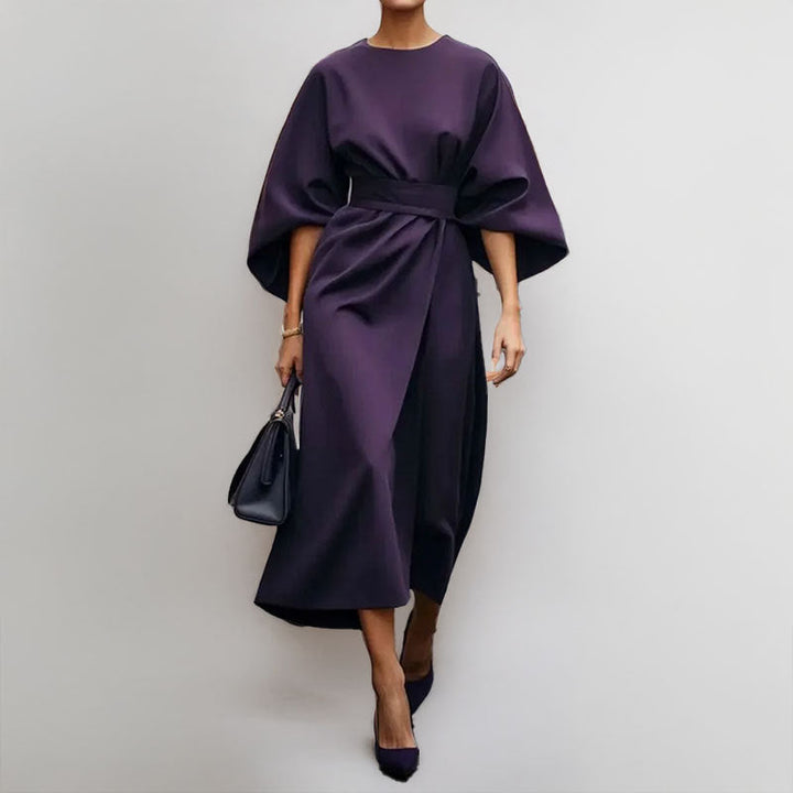 Women's satin batwing maxi dress, elegant draped silhouette, fitted waist, flowing skirt, perfect for formal occasions.