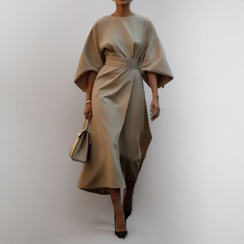 Women's satin batwing maxi dress, elegant draped silhouette, fitted waist, flowing skirt, perfect for formal occasions.