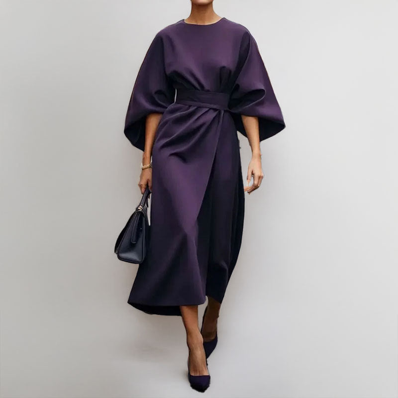 Women's satin batwing maxi dress, elegant draped silhouette, fitted waist, flowing skirt, perfect for formal occasions.