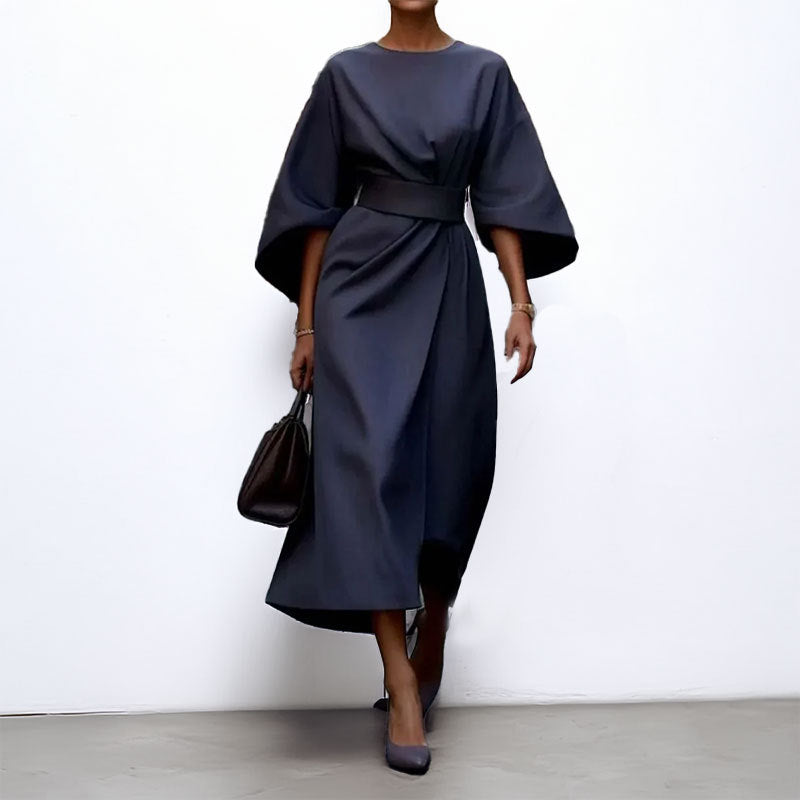 Women's satin batwing maxi dress, elegant draped silhouette, fitted waist, flowing skirt, perfect for formal occasions.