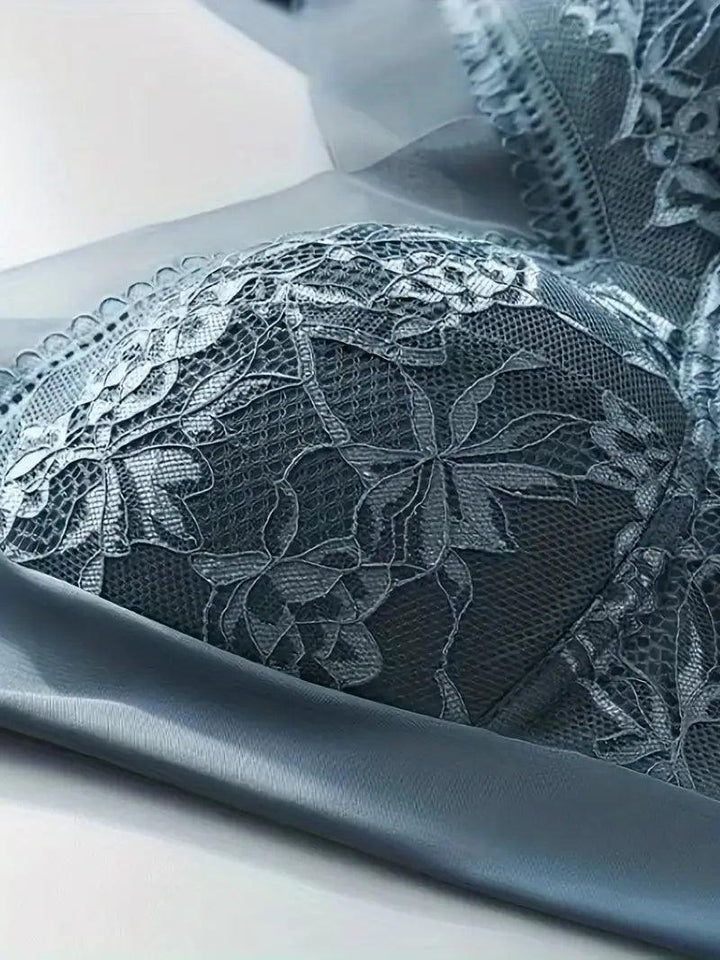 "Women's seamless wire-free bra with elegant lace overlay, full coverage, and invisible design for comfort and sophistication
