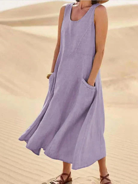Women's sleeveless cotton linen midi dress, summer style, lightweight, relaxed fit with pockets, perfect for casual days.