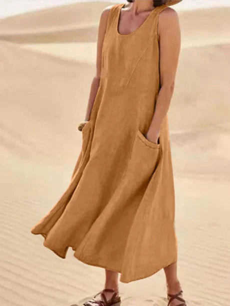 Women's sleeveless cotton linen midi dress, summer style, lightweight, relaxed fit with pockets, perfect for casual days.