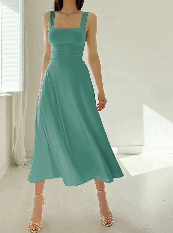 "Women's sleeveless dress, elegant design, flattering silhouette in black, baby blue, turquoise; perfect for any occasion."