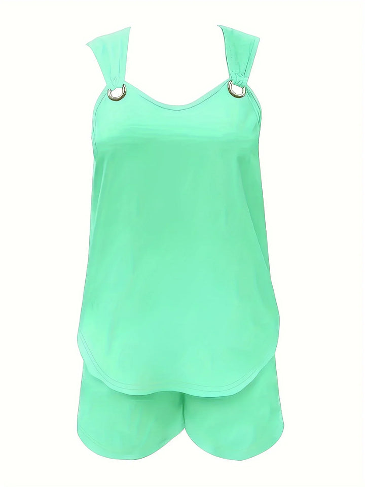 "Women's sleeveless romper with ring strap, pockets; elegant summer jumpsuit, lightweight fabric for chic, relaxed outings."