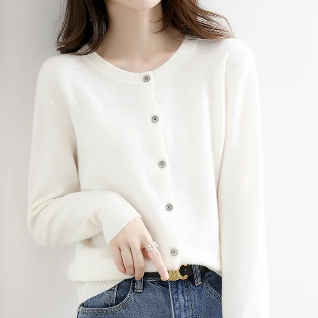 Women's soft cashmere button-up cardigan, classic design, long sleeves, versatile for casual and formal outfits.