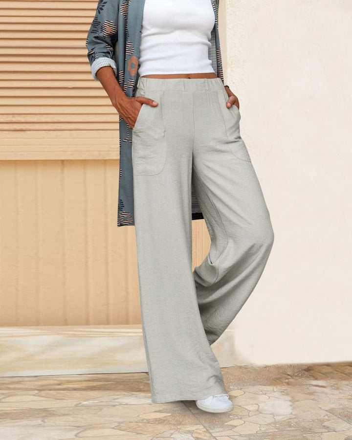 Women's soft casual wide-leg trousers with elastic waistband; relaxed fit, chic silhouette, perfect for lounging or outings.