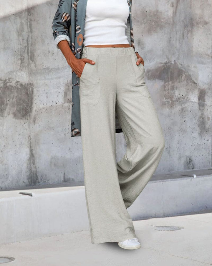 Women's soft casual wide-leg trousers with elastic waistband; relaxed fit, chic silhouette, perfect for lounging or outings.