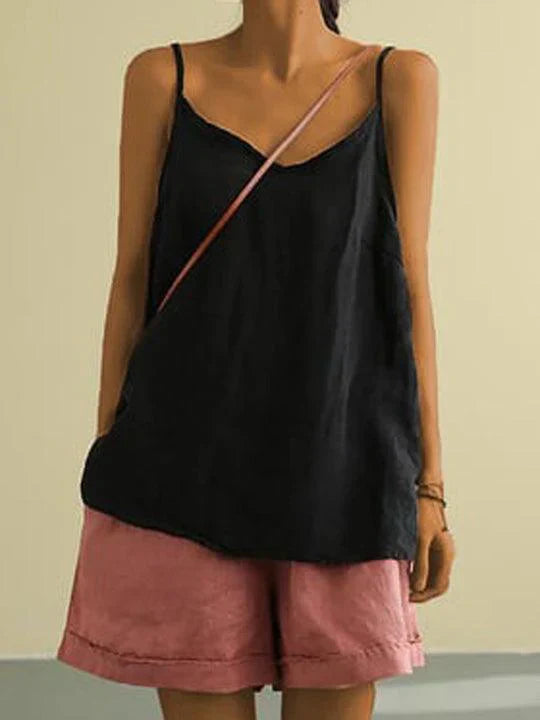"Women's spaghetti strap summer linen top, lightweight, flowy fit, perfect for warm days, showcases effortless style."