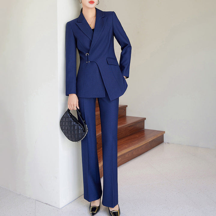 "Women's tailored blazer and trouser set; single-breasted blazer, lapel, waist pin, full-length sleek trousers."