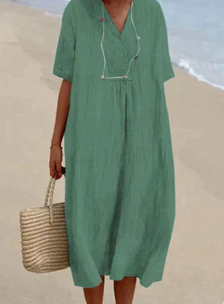 Women's V-Neck Relaxed Midi Dress in light, breathable fabric, featuring a flattering silhouette and perfect for warm weather