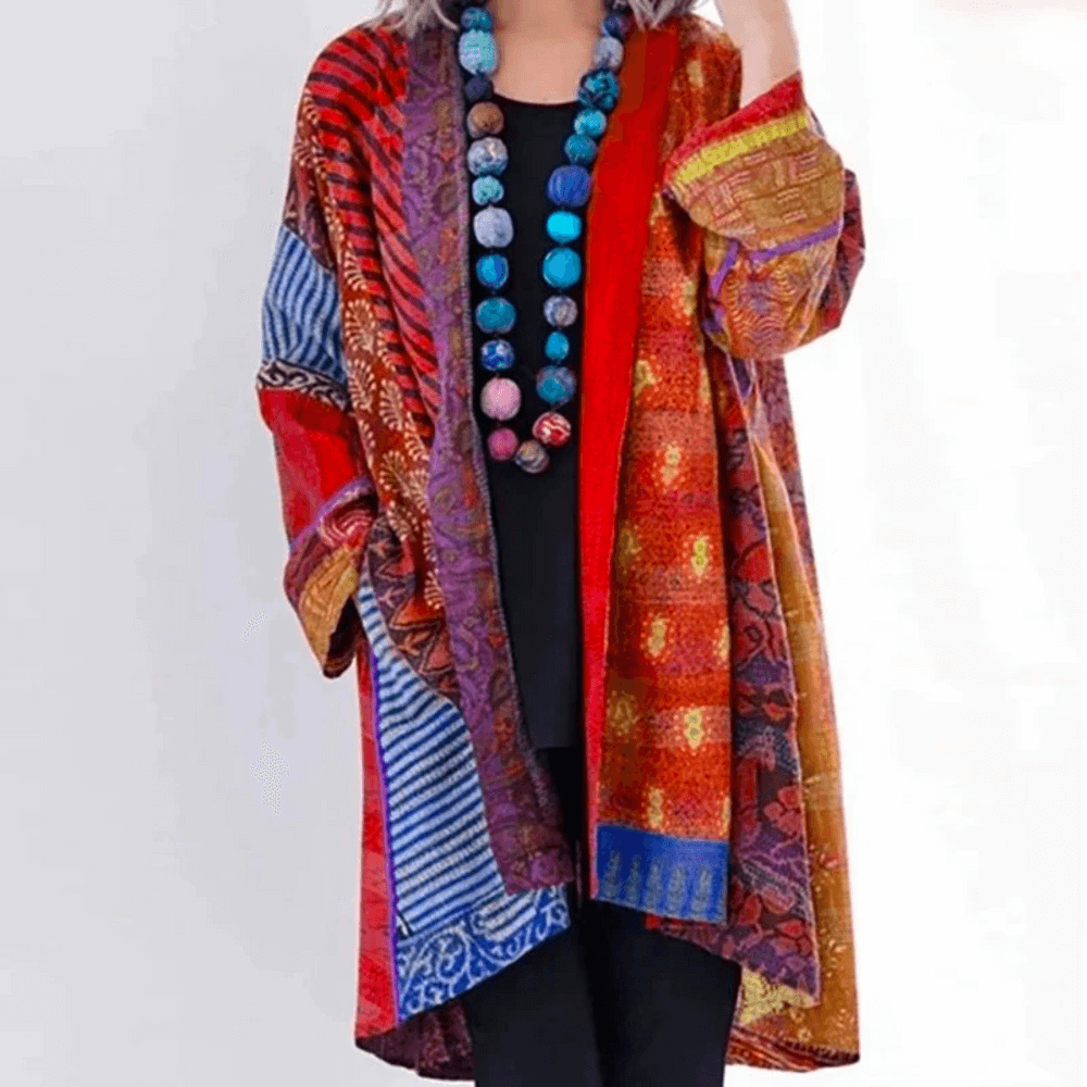 "Women's vibrant cardigan, modern-vintage style, colorful patterns, silky fabric, classic and modern fusion, front view."