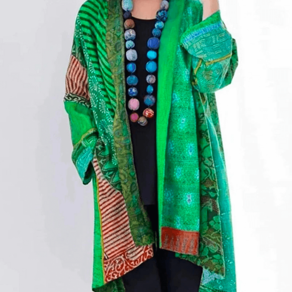 "Women's vibrant cardigan, modern-vintage style, colorful patterns, silky fabric, classic and modern fusion, front view."