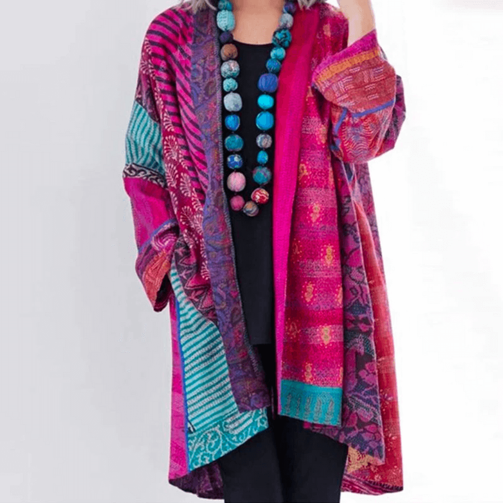 "Women's vibrant cardigan, modern-vintage style, colorful patterns, silky fabric, classic and modern fusion, front view."