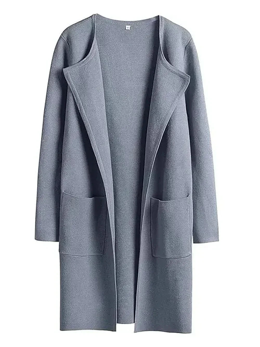 "Women's wool blend knee-length coat with wide lapel and patch pockets, showcasing a relaxed fit and minimalist design."